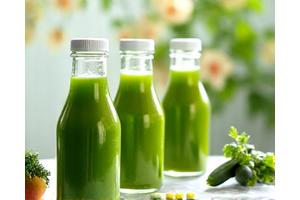 Fresh green juices and natural detox supplements against a spring background