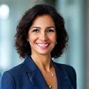 Dr. Anya Sharma, a nutrition scientist, smiling during an interview.